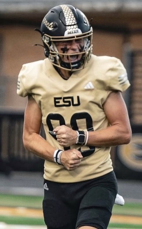 Jordan Cartwright celebrating in ESU #99 jersey